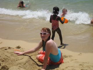 Courtney building a sand castle