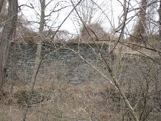 More woods and stone along the trail